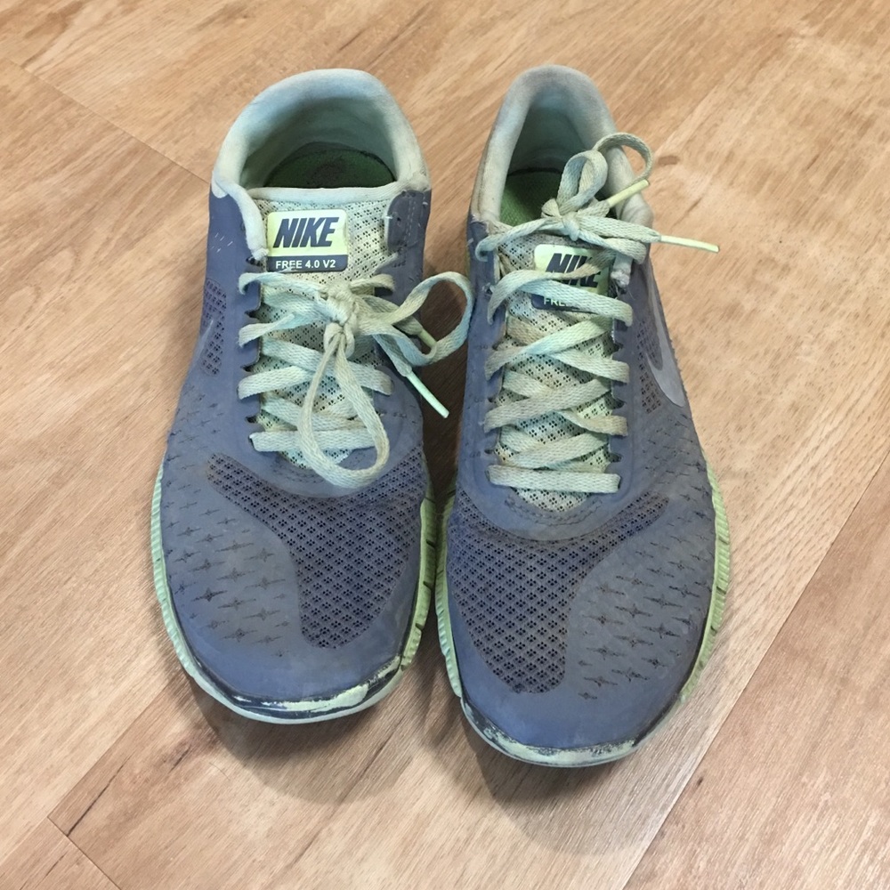 grey and neon green nike shoes